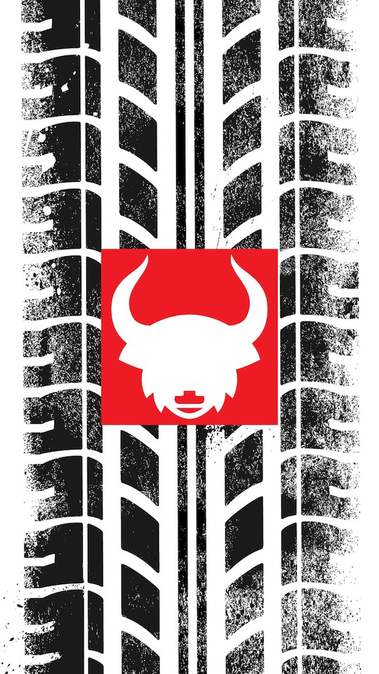 Digital art of a tire track with a bull head in the middle