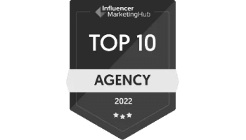 An award logo 'Influencer Marketing Hub Top 10 Agency 2022' text on it