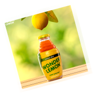 A bottle of WONDE lemon juice on a table