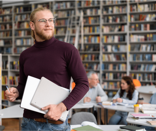 https://sociallyin.com/wp-content/uploads/2024/09/person-holding-book.png