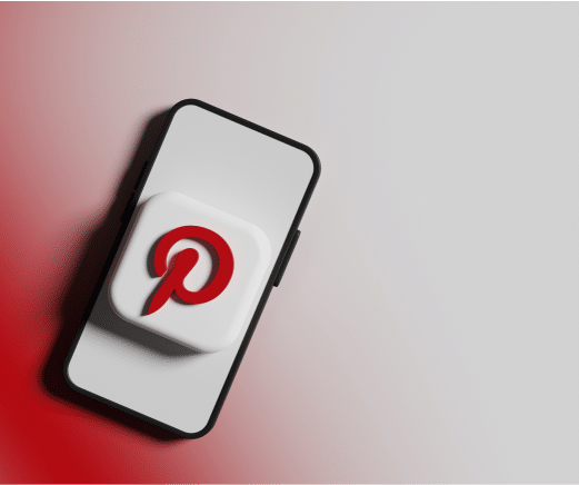 https://sociallyin.com/wp-content/uploads/2024/10/pinterest-logo-phone-screen.png