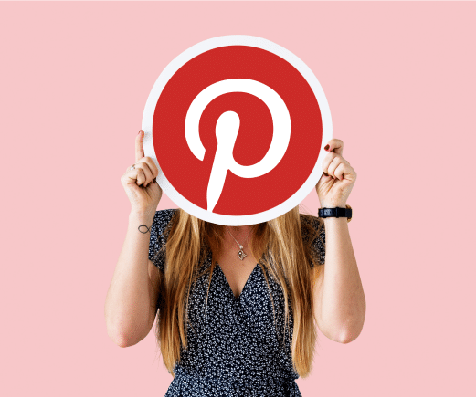 https://sociallyin.com/wp-content/uploads/2024/10/woman-showing-pinterest-icon.png