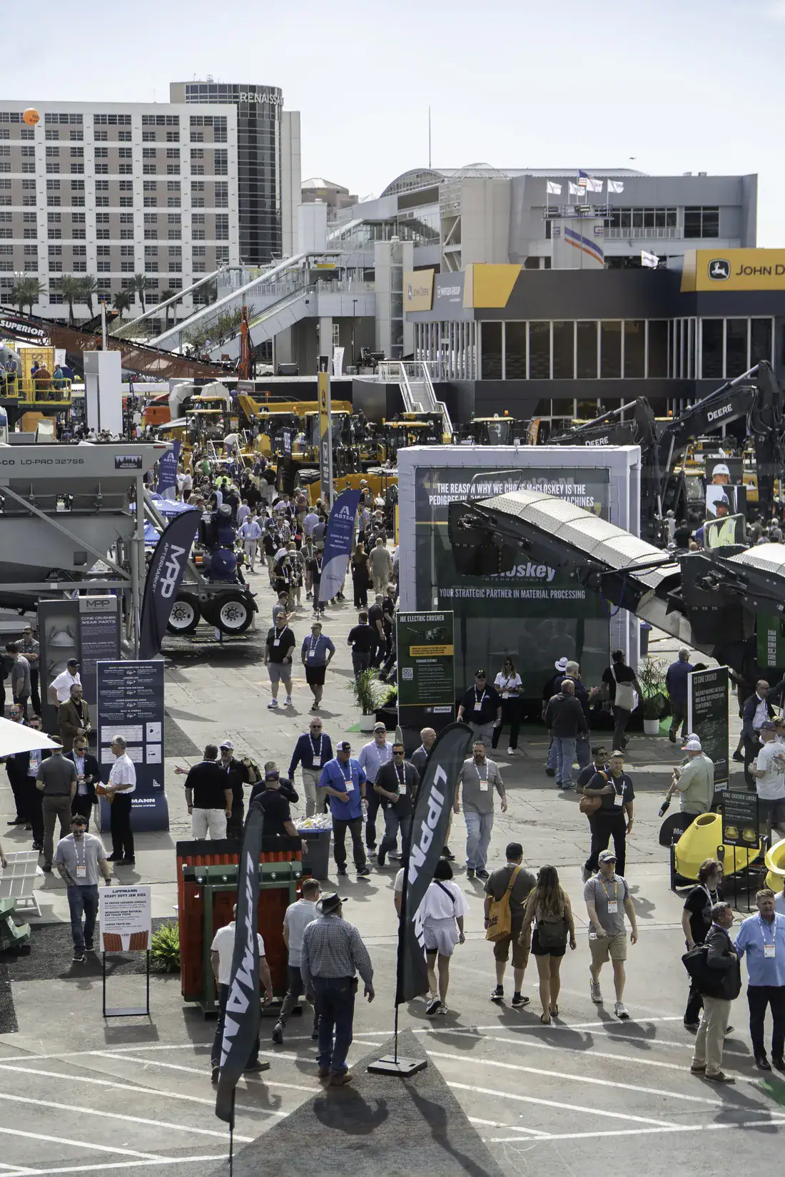 Attendees crowding the Diamond Lot between crushing and screening equipment at CONEXPO-CON/AGG 2026